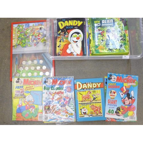 736 - A box of various comics, most with free gifts, a TMNT print and coin collection, etc.