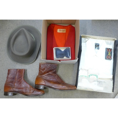 738 - A collection of clothing, including a ceremonial waistcoat with brass buttons, 1970s Grenson boots s... 