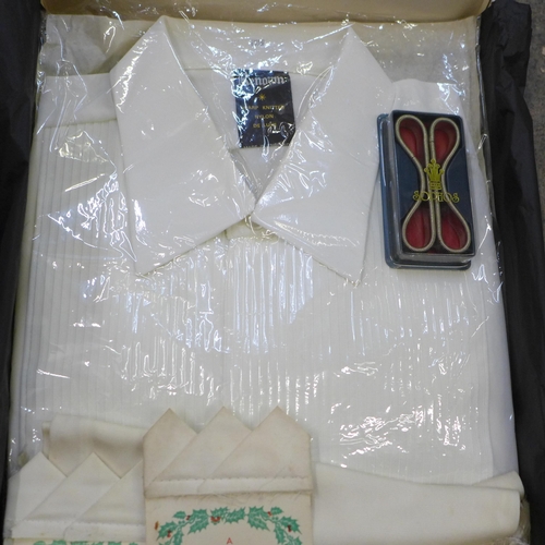 738 - A collection of clothing, including a ceremonial waistcoat with brass buttons, 1970s Grenson boots s... 