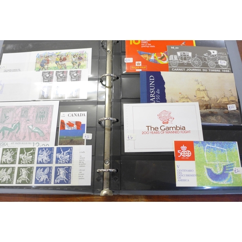 752 - Stamps; an album of worldwide stamp booklets, 93 in total, with a catalogue value of over £850 as st... 