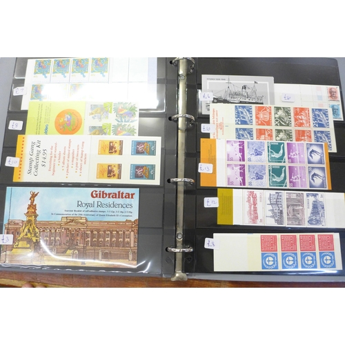 752 - Stamps; an album of worldwide stamp booklets, 93 in total, with a catalogue value of over £850 as st... 