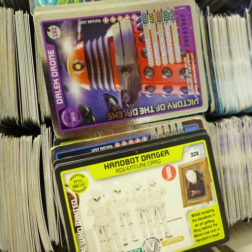 756 - A box of Doctor Who Battles in Time cards and a box of phone cards