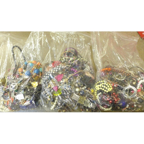 763 - Three bags of costume jewellery