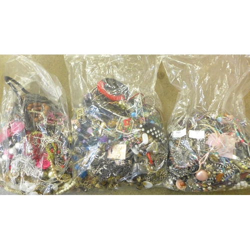 763 - Three bags of costume jewellery