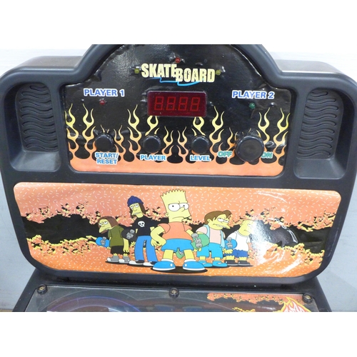 782 - A Simpsons pin-ball machine, lacking 9v 700mA power supply