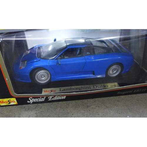 784 - Five die-cast model vehicles, three Maisto Special Edition and two Bburago