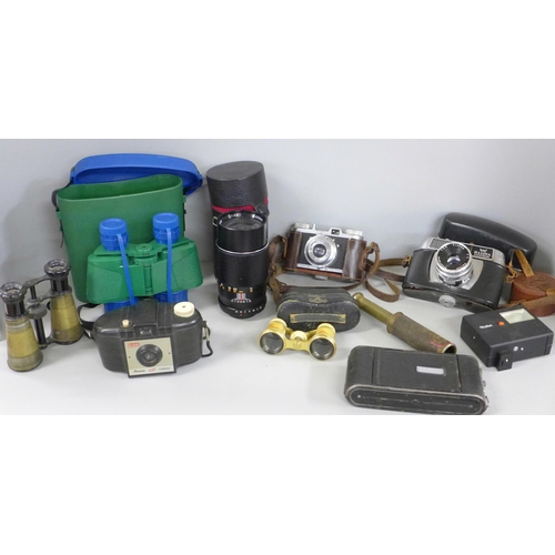 786C - A collection of cameras and camera accessories and lens including Polaroid, etc.