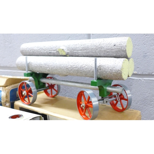 801 - A Mamod TE1A steam tractor with accessories and instructions and a Mamod LW. 1 Lumber Wagon, both bo... 