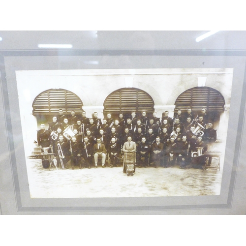 805 - A framed and mounted photograph of a brass band, possibly military