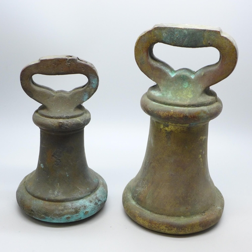 806 - Two vintage brass weights, 50 and 100 troy oz