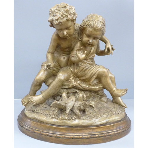 811 - A figure group, sculpture of two putti, 36cm