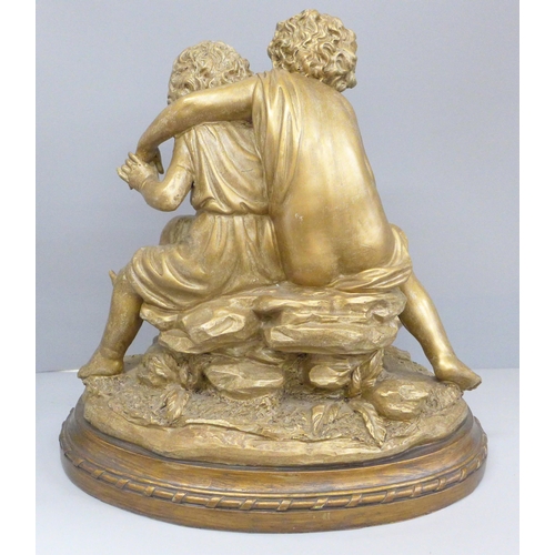 811 - A figure group, sculpture of two putti, 36cm