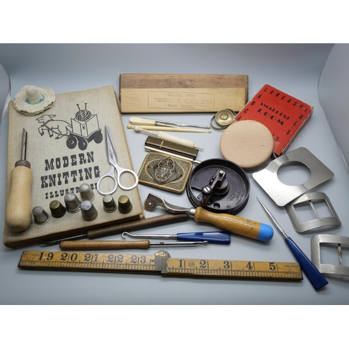 860 - A collection of sewing items including bakelite rug cutter, three silver thimbles including Charles ... 