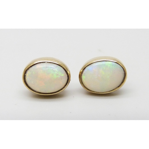 875 - A pair of 9ct gold and opal earrings, 1.6g