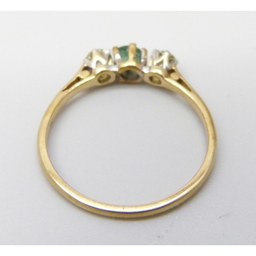 879 - An 18ct gold, emerald and diamond ring, 1.9g, O