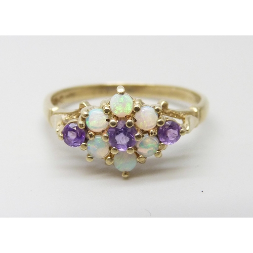 881 - A 9ct gold, opal and amethyst cluster ring, 2.2g, R