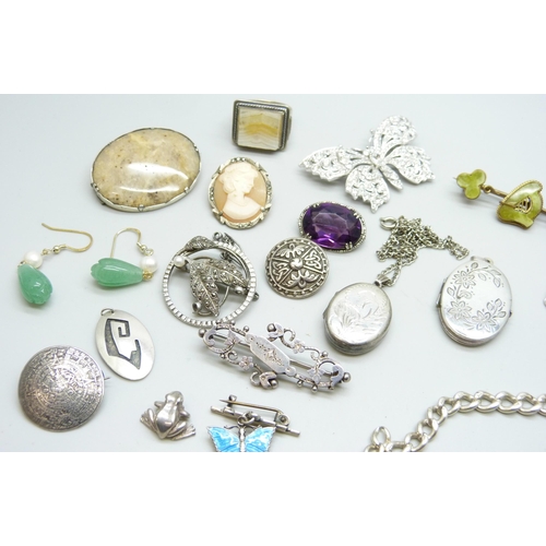 882 - A Victorian silver brooch, a silver bracelet, a silver chain lacking fasteners, a silver locket and ... 