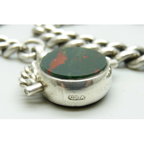 892 - A silver Albert watch chain, graduated curb links, with a silver set agate swivel fob, 73g, clip to ... 