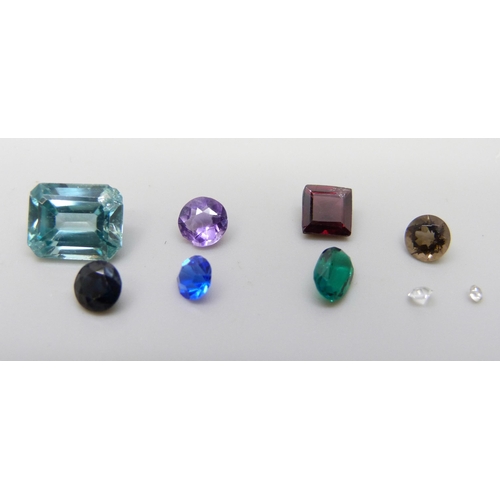 896 - Unmounted gemstones, topaz, sapphire, amethyst, emerald, etc., 6.70 carat weight