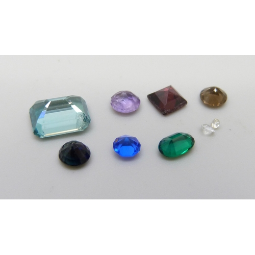 896 - Unmounted gemstones, topaz, sapphire, amethyst, emerald, etc., 6.70 carat weight