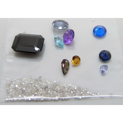 897 - Unmounted gemstones, garnet, spinel, topaz, amethyst, quartz, etc., also 1 carat of diamonds, total ... 