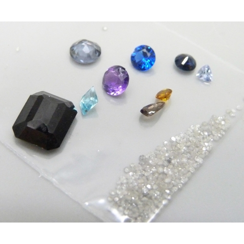 897 - Unmounted gemstones, garnet, spinel, topaz, amethyst, quartz, etc., also 1 carat of diamonds, total ... 