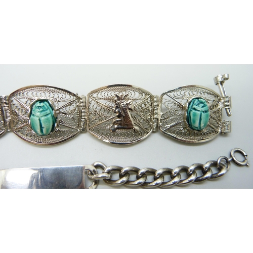 900 - An Egyptian scarab beetle bracelet and a silver Identity bracelet, (ID bracelet 23g)