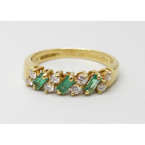 906 - An 18ct gold emerald and diamond ring, 3.7g, N