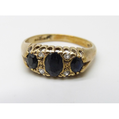 910 - A 9ct gold stone set ring, 2.7g, N