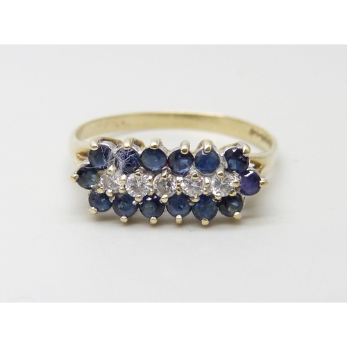 918 - A 9ct gold, sapphire and white stone ring, 2g, R