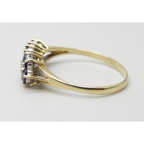 918 - A 9ct gold, sapphire and white stone ring, 2g, R