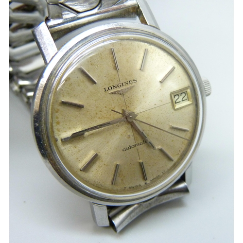 931 - Two wristwatches, Longines automatic and Excalibur