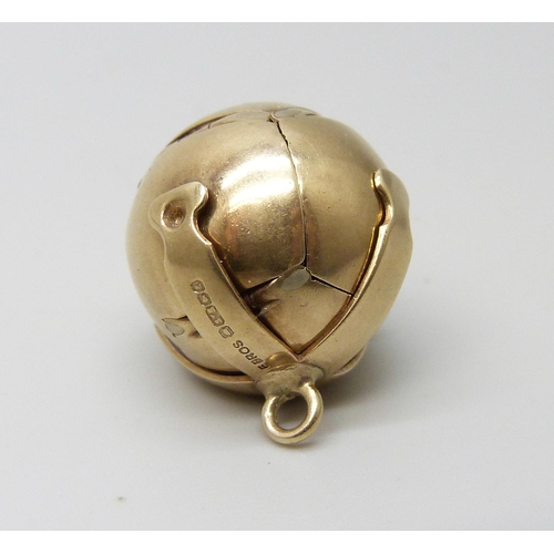 934 - A hallmarked 9ct gold Masonic ball pendant, London 1979, F. Bros., 8.9g