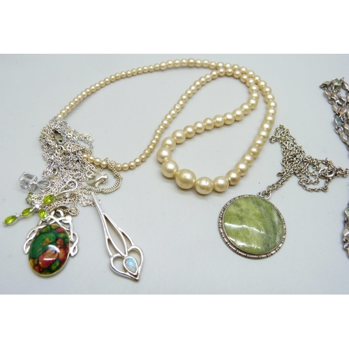 936 - Three silver pendants and chains, one other pendant and chain, two necklets and a faux pearl necklac... 