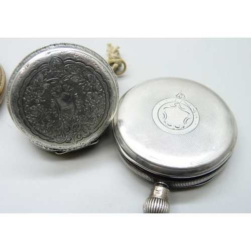 939 - A silver fob watch with key, Birmingham 1885, lacking minute hand, a Waltham Traveler silver cased p... 