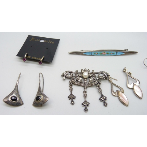 941 - A collection of silver jewellery including an enamelled brooch marked 800