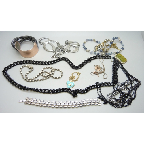 970 - A collection of designer jewellery including Vivienne Westwood, Trifari, Fossil, Corocraft, etc.