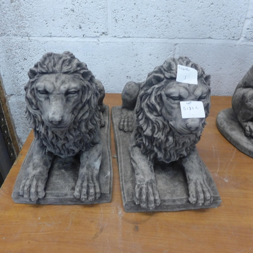 5151C - A pair of concrete stone effect laying lions approx. 17