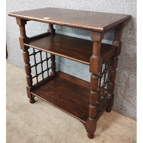 108 - An Arts and Crafts Liberty & Co. oak side table, designed by Leonard Wyburn