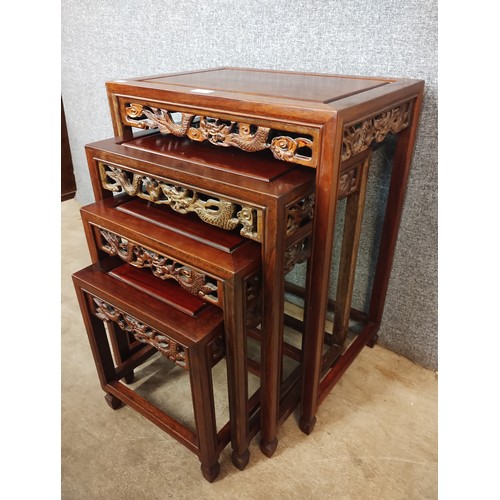 110 - A Chinese hardwood nest of quartetto tables