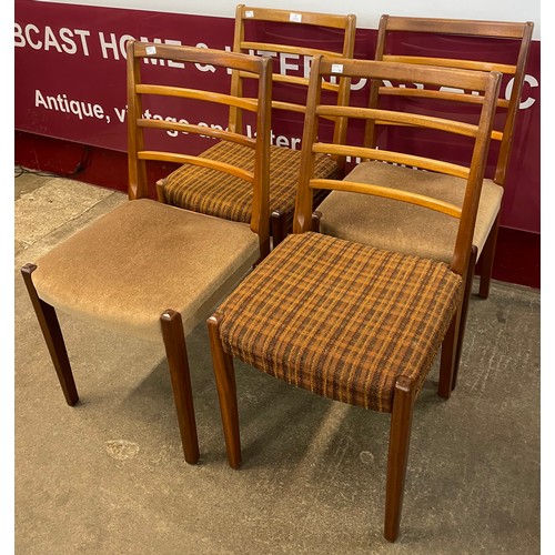 52 - A set of four teak dining chairs