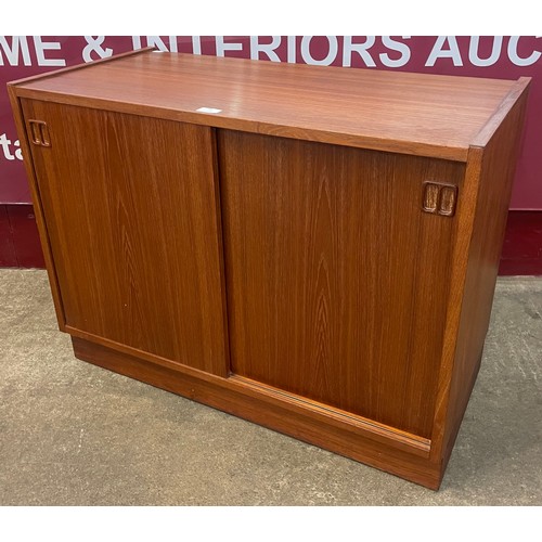 59 - A Danish teak two door fitted cabinet