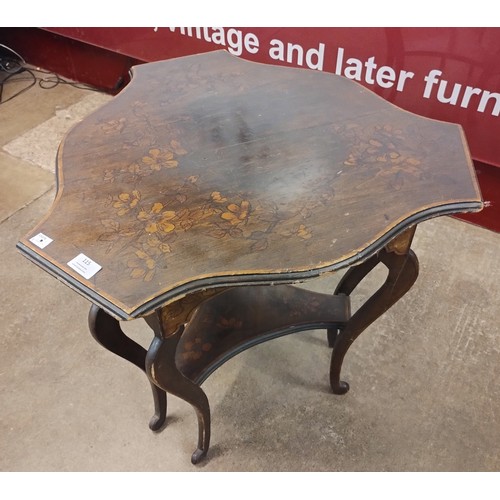 115 - An Art Nouveau mahogany and penwork trefoil shaped occasional table