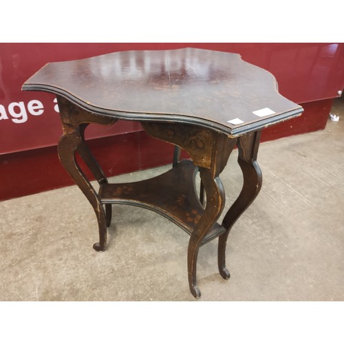 115 - An Art Nouveau mahogany and penwork trefoil shaped occasional table