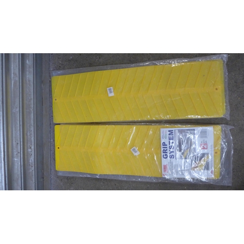 5299 - A Melenco wheel clamp with key, a pair of Melenco towing mirrors and a set of ramps and grips and a ... 