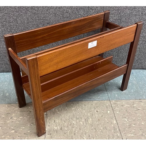 65 - A teak magazine rack