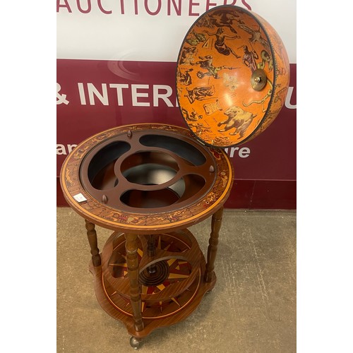 70 - An Italian style terrestrial globe cocktail trolley/cabinet