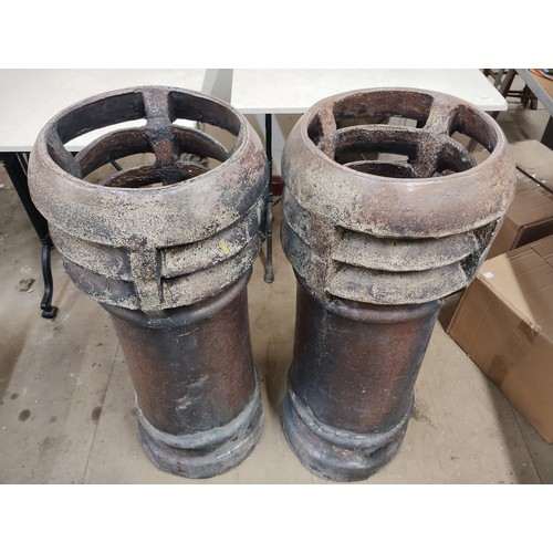 308 - A pair of Victorian salt glazed terracotta chimney-pots