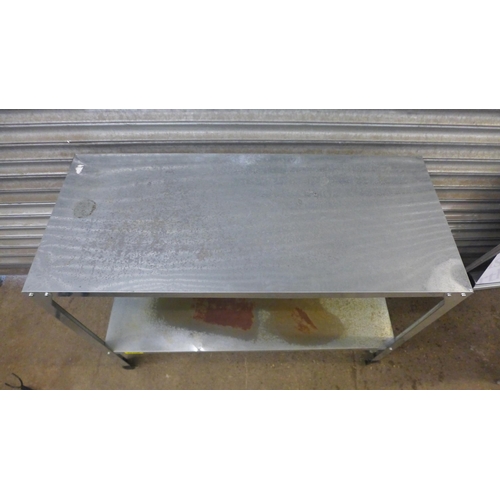 5129 - A galvanized steel work table approximately 46