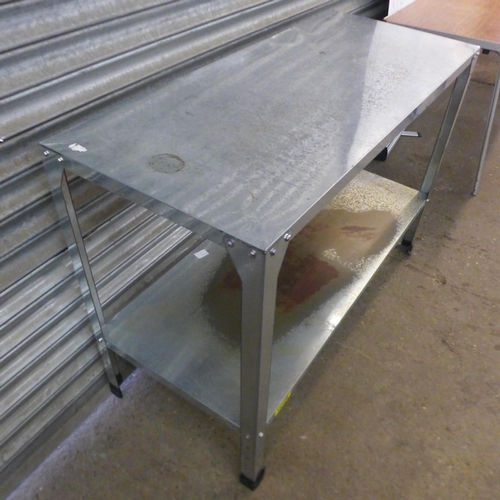 5129 - A galvanized steel work table approximately 46